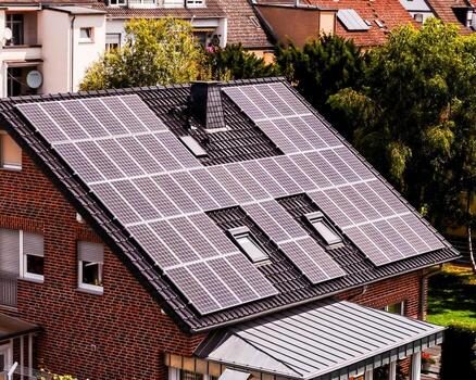 Solar panels on a bright home rooftop